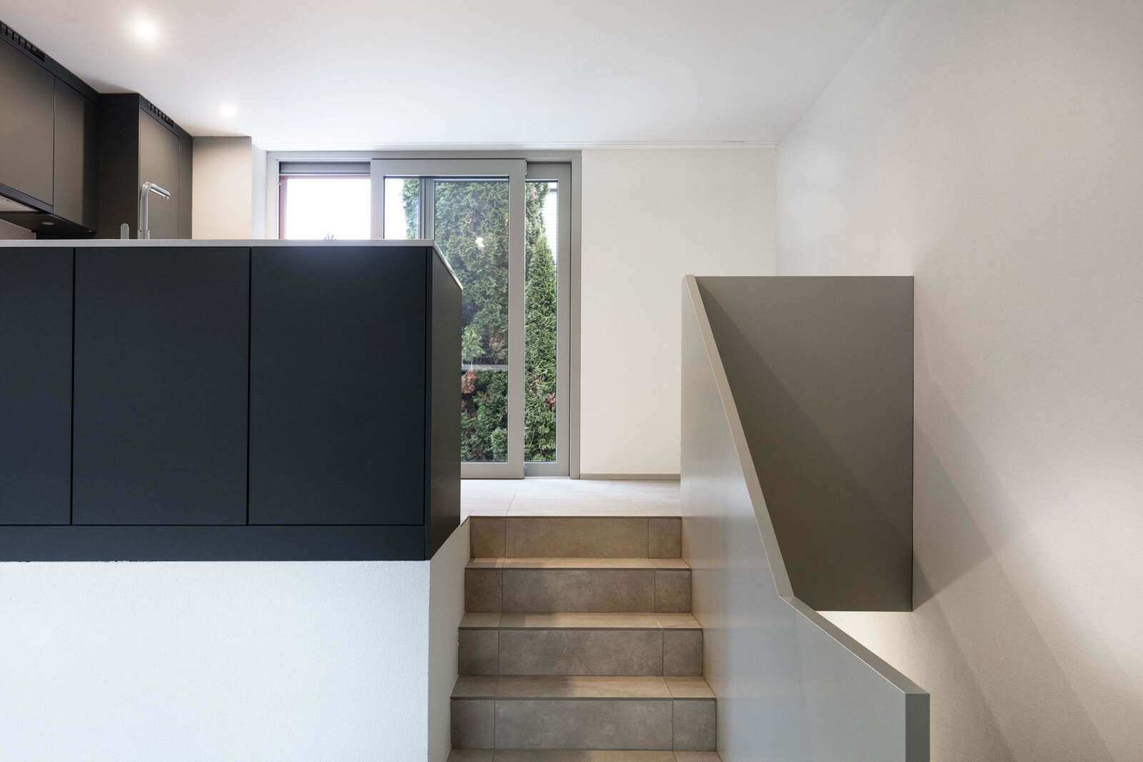 Orlando Architektur Neubau Einfamilienhaus mit Einliegerwohnung Oberfeldweg Winterthur 16 Einliegerwohnung Küche