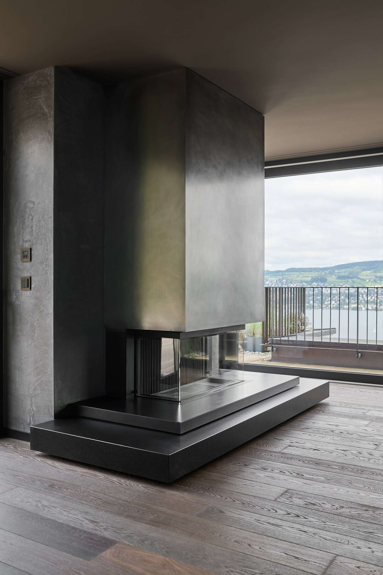 Orlando Architektur Umbau Wohnung Tödistrasse Horgen 15 Kamin Bronze