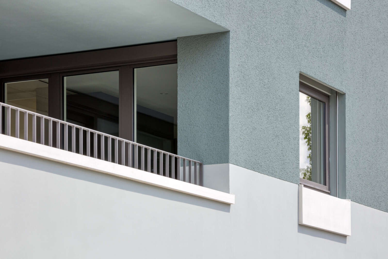 Orlando Architektur Neubau Mehrfamilienhaus Rigistrasse Pfäffikon ZH 16 Fassadendetail Materialisierung