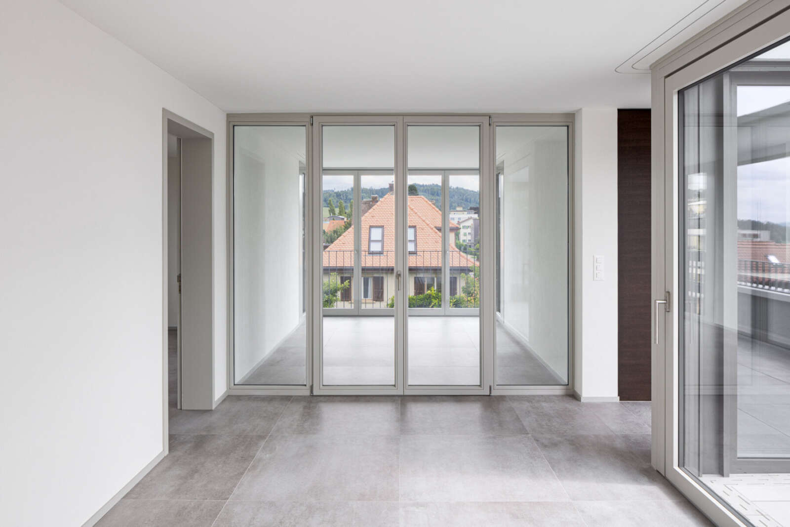 Orlando Architektur Neubau Mehrfamilienhaus Rigistrasse Pfäffikon ZH 6 Wohnen Wintergarten