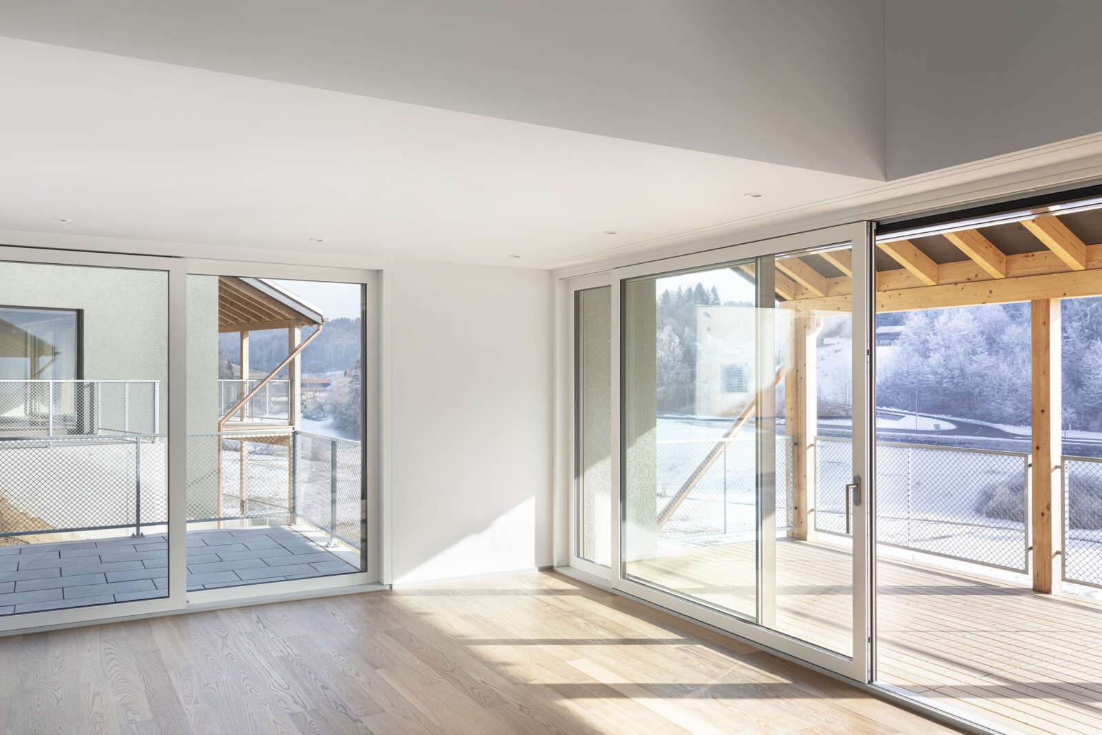 Orlando Architektur Neubau zwei Doppeleinfamilienhaeuser im Schueracher Waltenstein 7 Wohnraum Lauben Aussicht