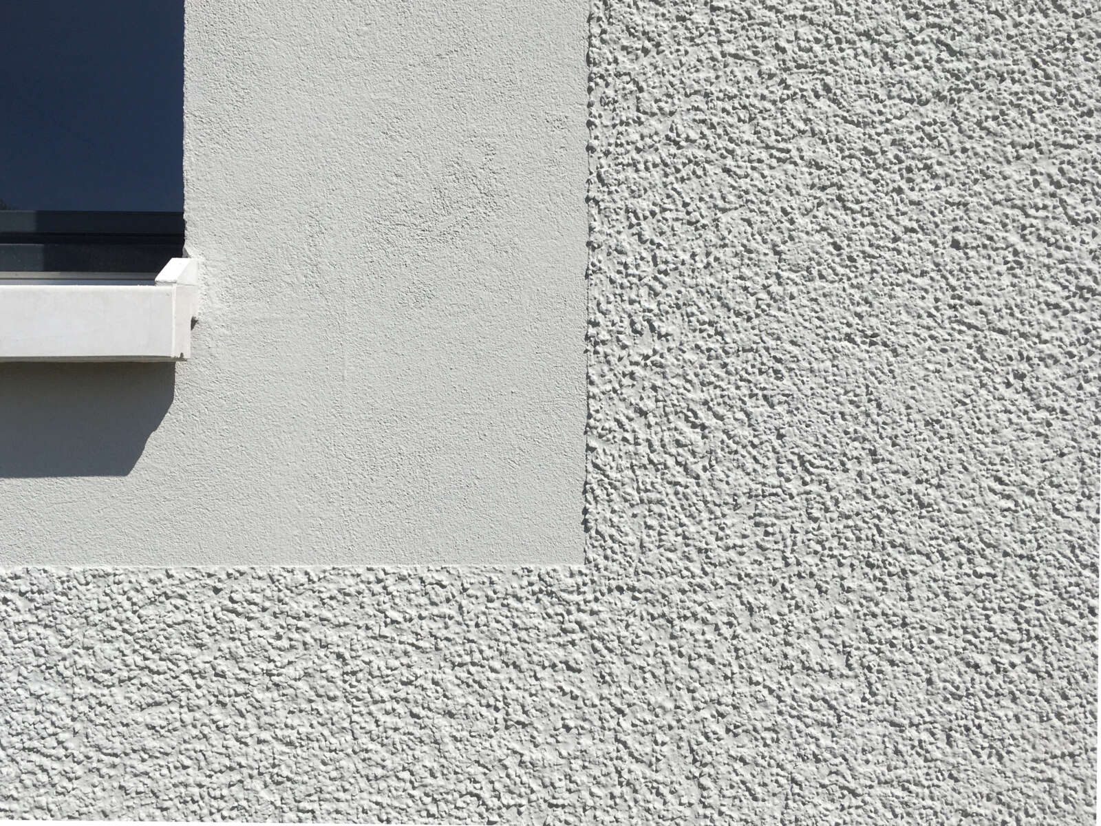 Orlando Architektur Umbau Erweiterung Anbau Ausbau Einfamilienhaus Hardgutstrasse Winterthur 3 Fassade Detail Putz